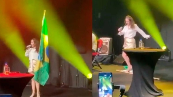 Esquerdismo: Filha do cantor João Gilberto pisa na bandeira do Brasil durante show